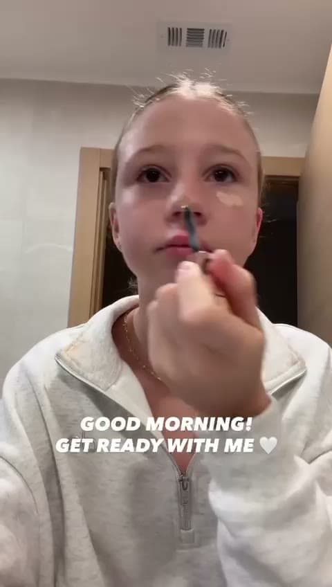 Beauty creator filming a morning makeup routine