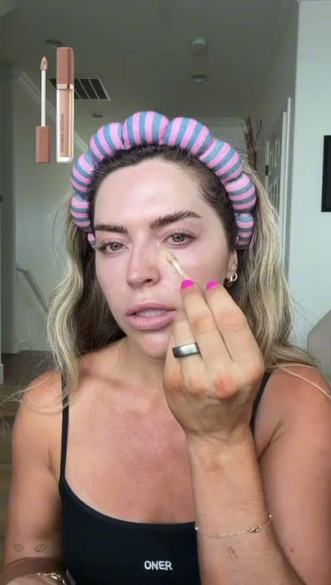 Beauty creator demonstrating a makeup product